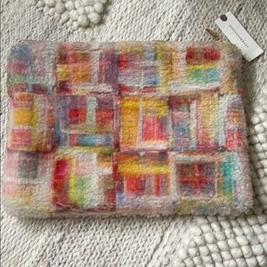 Fluffy Sherpa Pouch from Anthropologie.
